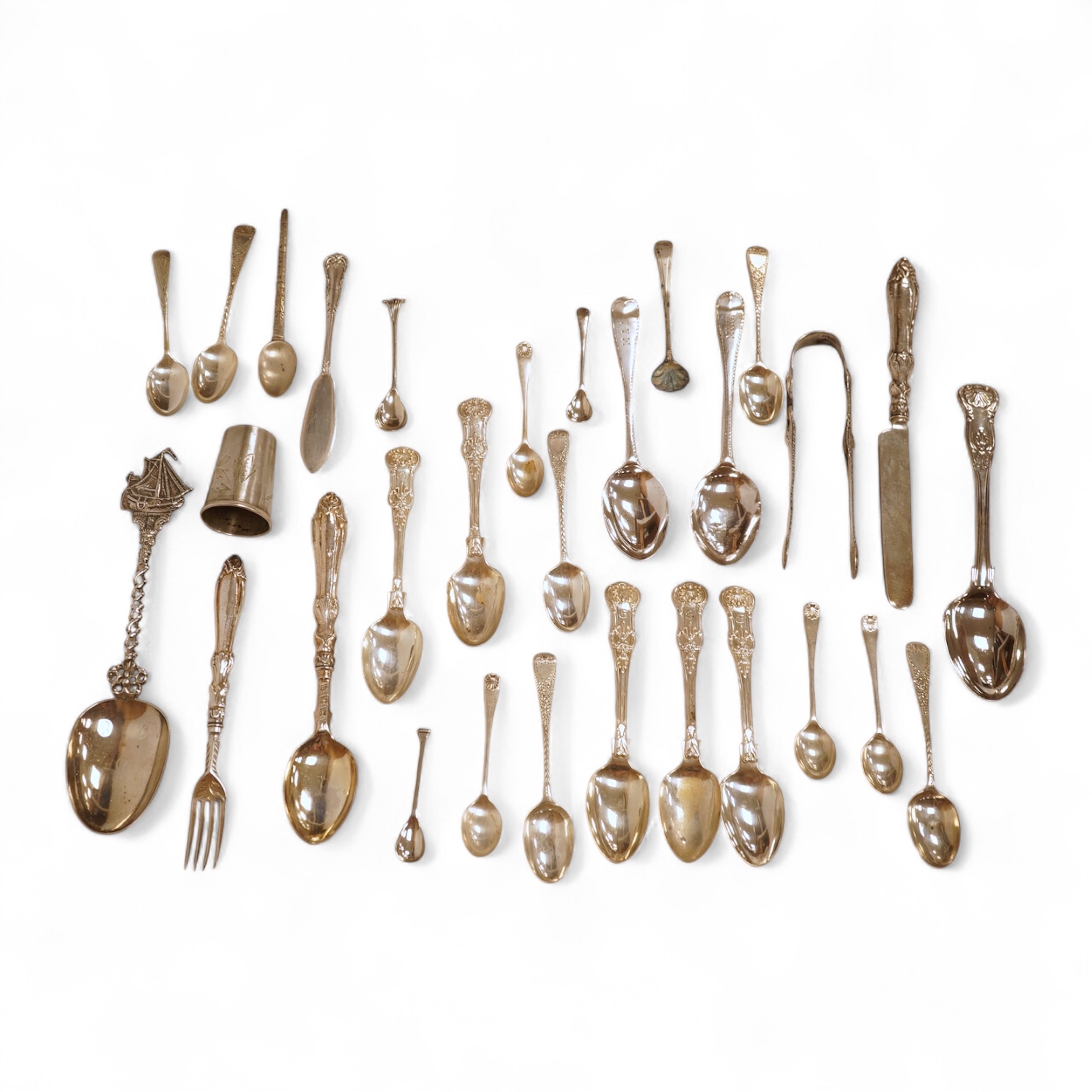 A small quantity of assorted mainly 19th century and later small flatware including teaspoons, coffee spoons and condiment spoons, various dates and makers, a Dutch? white metal spoon and a Victorian silver christening t